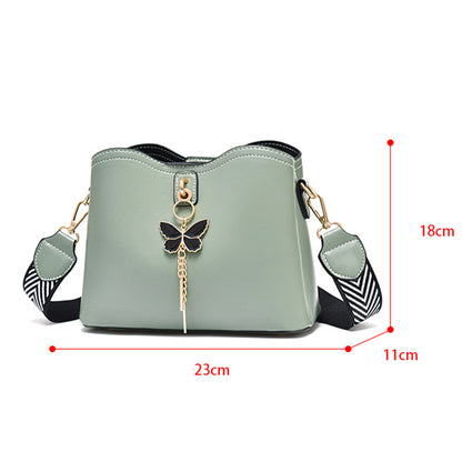 Dollcini Elegáns Női Futártáska – Műbőr, Pillangós Medállal